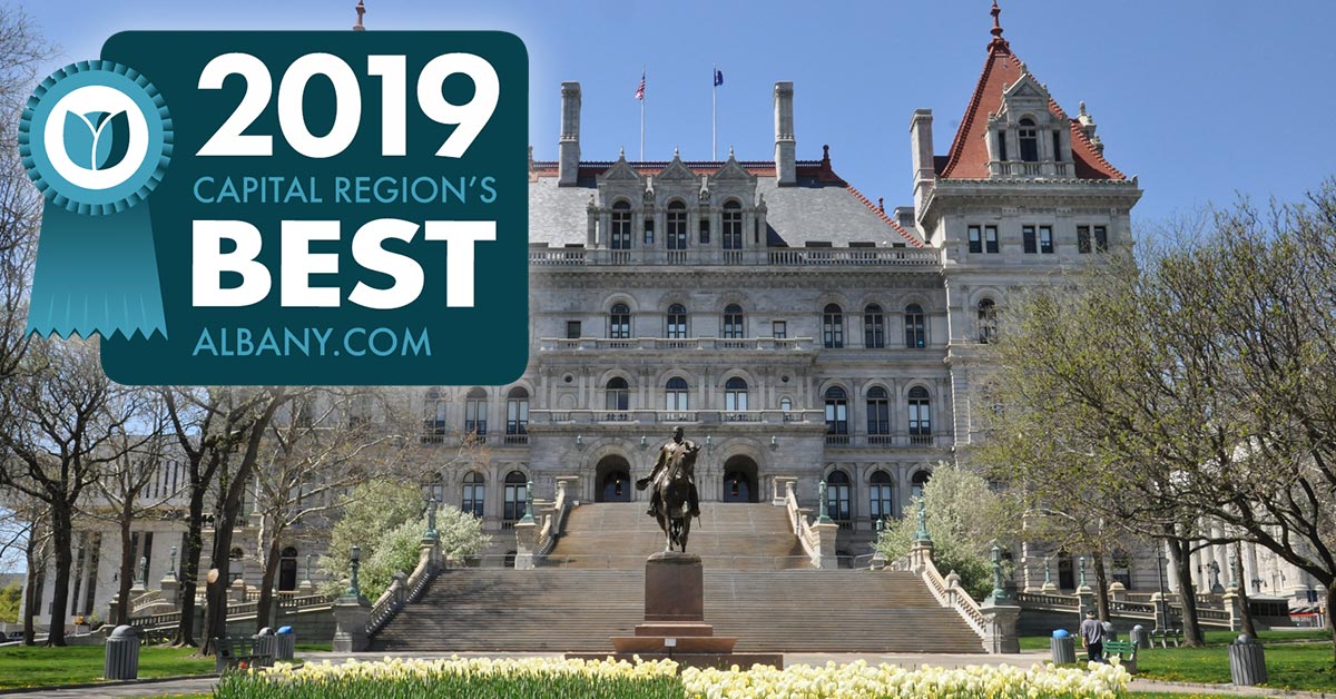 new york state capitol with region's best badge
