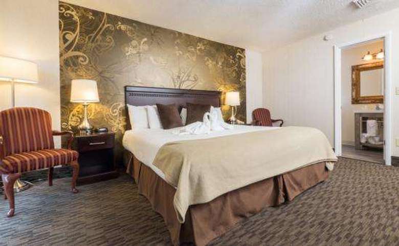 a king-sized bed in a hotel room