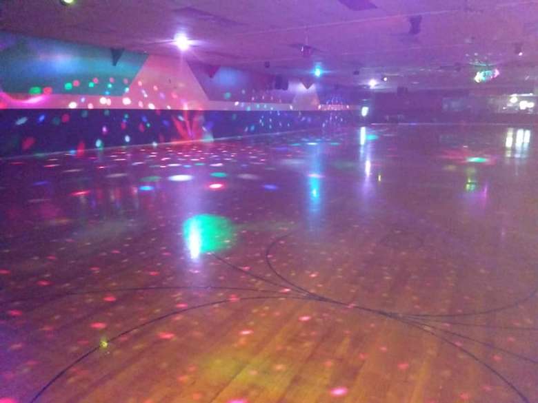Rollarama Skating Center Empty Floor with Disco Ball and Lights Going