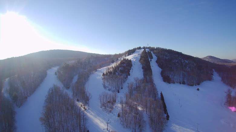 aerial perspective of mountain with ski routes