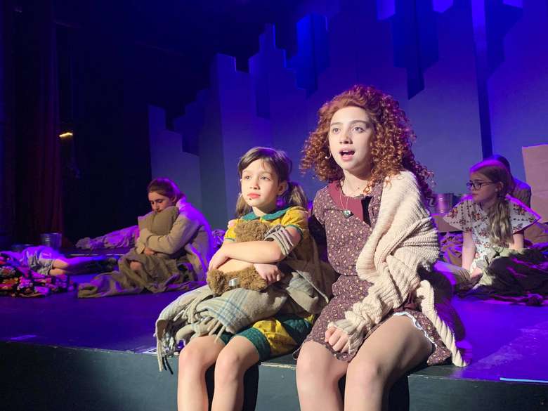 kids on stage during play