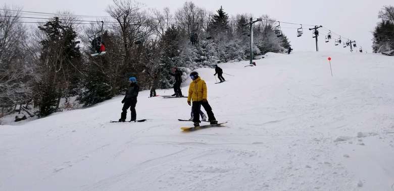 people skiing down McCauley Mountain