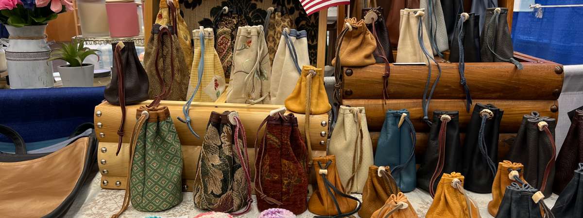 purses for sale on a table